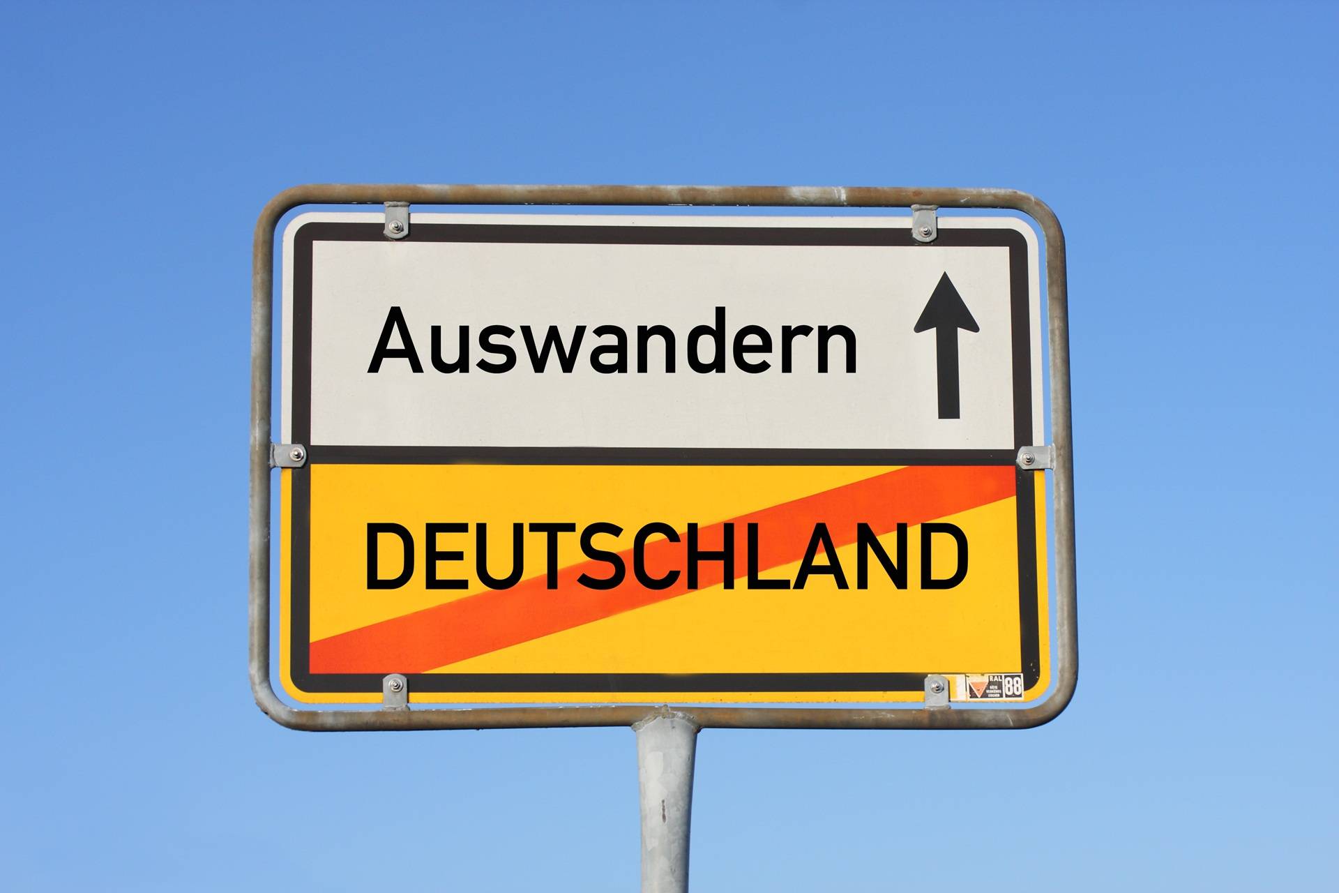Ortsschild mit Auswanderungshinweis | Haushaltsauflösung Wuppertal